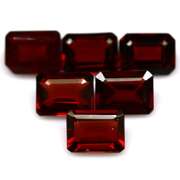 Heavy 11.89ct untreated emerald cut Garnet set
