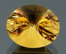 Vibrant 3.38ct 9x11mm concave cut Citrine