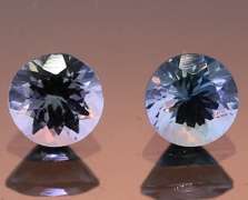 Glittering 1.41ct pair of silvery blue Tanzanite