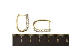 10K Yellow Gold 0.81 Ctw Squared Diamond Encrusted Oval Hoop Earrings