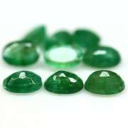 Rich emerald green 6.44ct 9pc emerald set