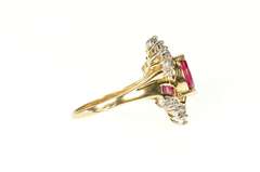 10K Yellow Gold Marquise Syn. Ruby Cubic Zirconia Halo Bypass Ring