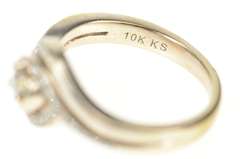 10K White Gold Round Diamond Wavy Bypass Engagement Ring