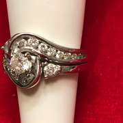 Ladies 14k white gold and diamond wedding set.