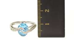14K White Gold Oval Blue Topaz Diamond Wavy Statement Ring