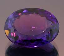 Oval cut 17.60ct royal purple created Amethyst