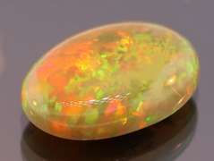 Magnificent 4.58ct full body flashing Semi Black Opal