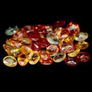 Glittering 7.90ct fancy color Sapphire set