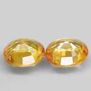 Glittering 1.25ct pair of golden Songean Sapphires