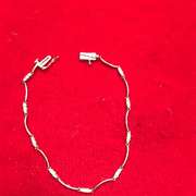 Ladies 10k white gold and diamond bracelet