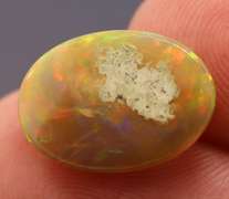 Magnificent 4.58ct full body flashing Semi Black Opal
