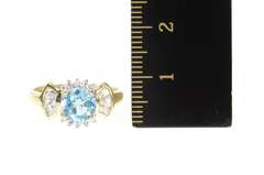 10K Yellow Gold Oval Blue Topaz Cubic Zirconia Halo Ring