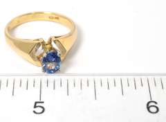 Dazzling Sapphire Solitaire Ring in 14KT Yellow Gold