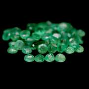 Rich emerald green 7.35ct 63pc emerald set
