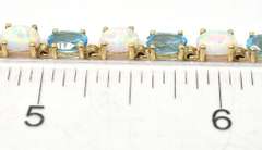 Charming Topaz & Opal Bracelet in Yellow Gold