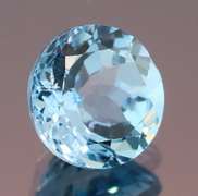 Fiery 4.98ct heavy flashing Topaz solitaire