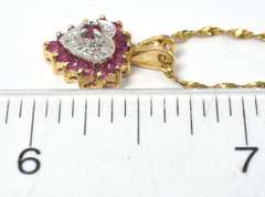 Charming Ruby & Diamond Necklace in Yellow Gold
