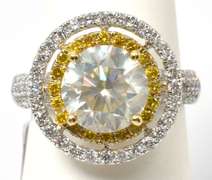 Striking 18KT 4.15CTW Yellow & White Diamond Ring