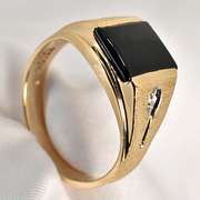 Man's Black Onyx and Gold Ring