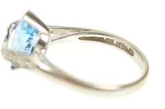 14K White Gold Oval Blue Topaz Diamond Wavy Statement Ring