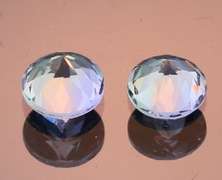 Glittering 1.46ct pair of silvery blue Tanzanite