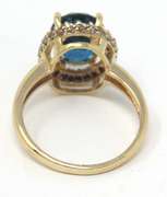 Pretty London Blue Topaz & Chocolate Diamond Halo Ring