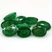 Rich emerald green 6.44ct 9pc emerald set