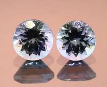 Glittering 1.46ct pair of silvery blue Tanzanite