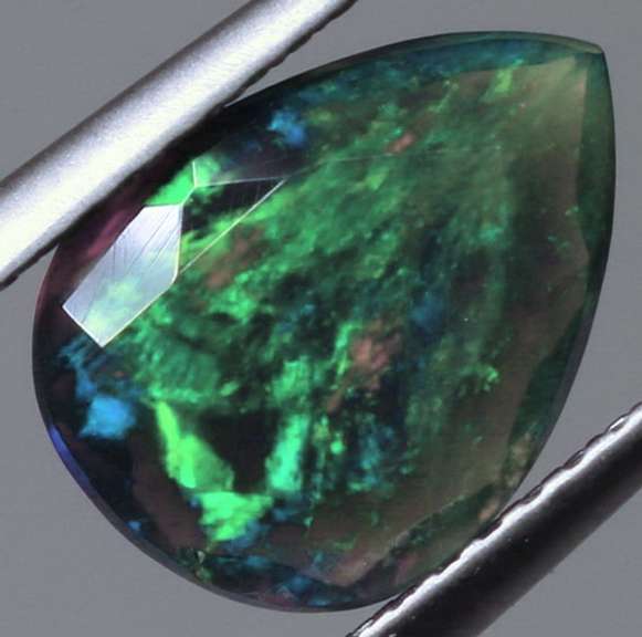 Silky 1.56ct floral fairy fire flashing Black Opal