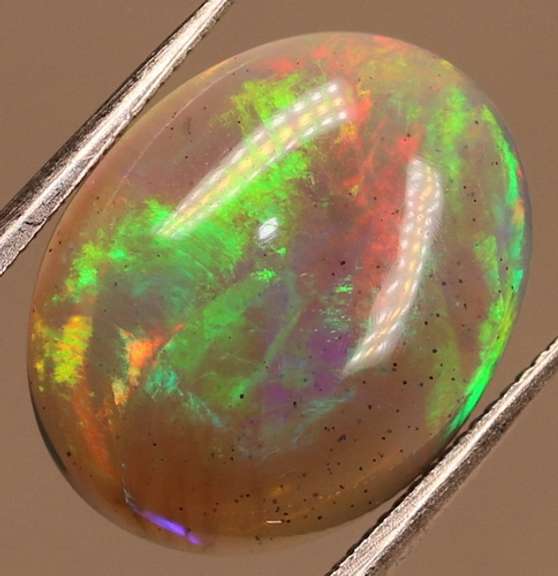 Glowing! 2.27ct full cover multi-pattern black Opal