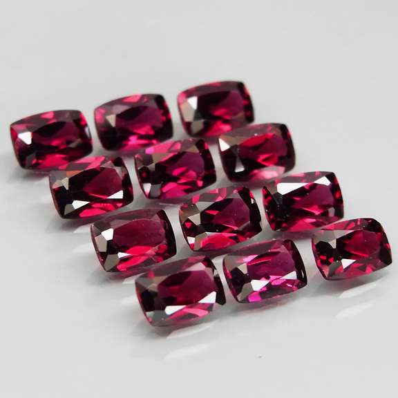Amazing 8.17ct cushion cut cherry red Garnet set