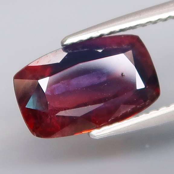 Swirling multi-color 3.15ct cushion cut Sapphire