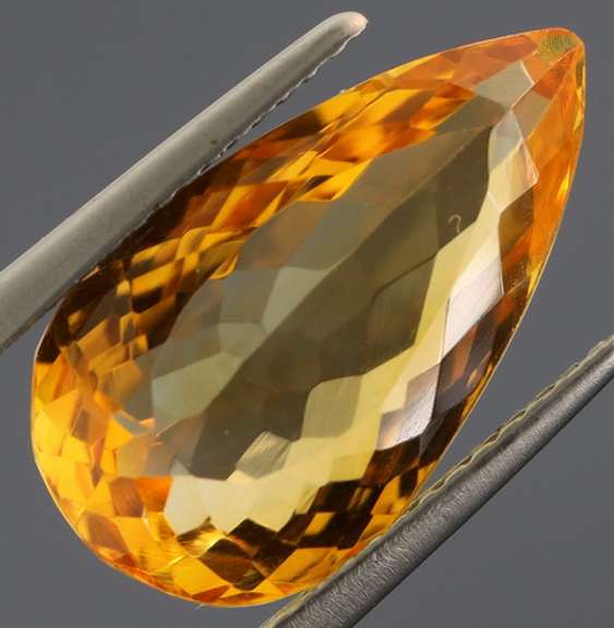 Vibrant 7.89ct golden orange pear cut Citrine