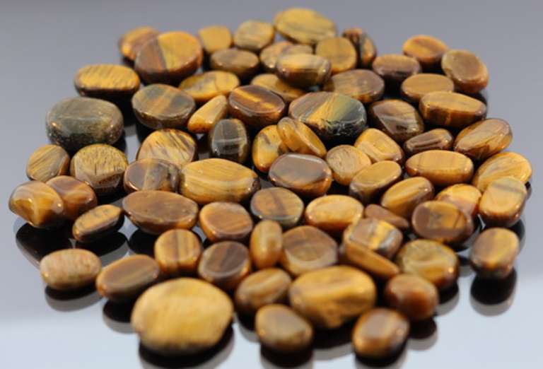 Huge 325.5ct parcel of natural Tigers Eye cabochons