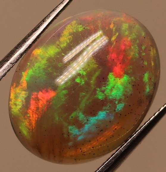 Glowing! 2.27ct full cover multi-pattern black Opal