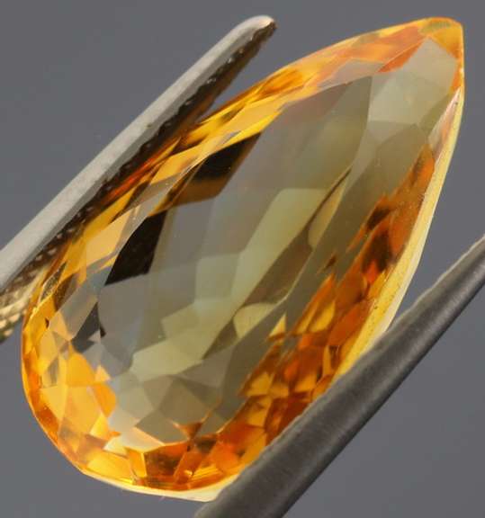 Vibrant 7.89ct golden orange pear cut Citrine