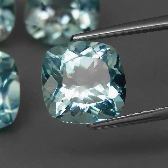 Large 17.85ct vivid blue cushion cut Topaz set