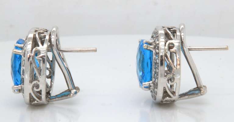 Powerful White Gold Cushion Blue Topaz and Diamond Earrings