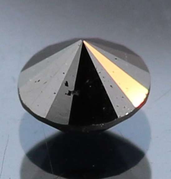 Very fine 1.39ct smooth cut Black Diamond solitaire
