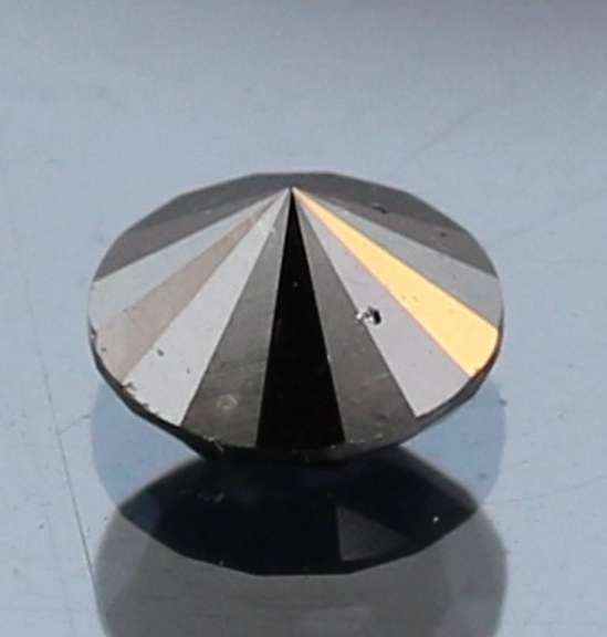 Very fine .83ct smooth cut Black Diamond solitaire