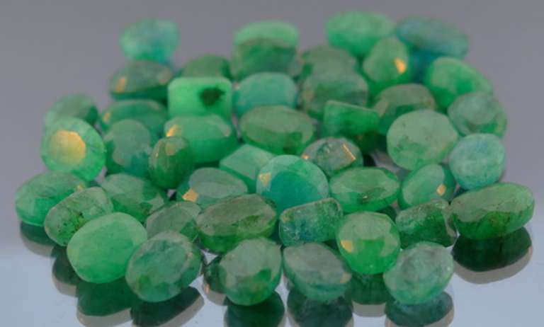 Heavy 307ct collection of Emeralds