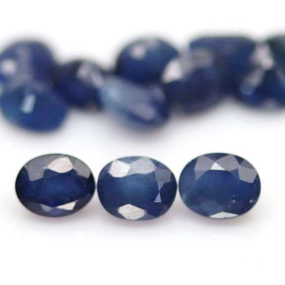 Heated only! 7.88ct deep blue sapphire set