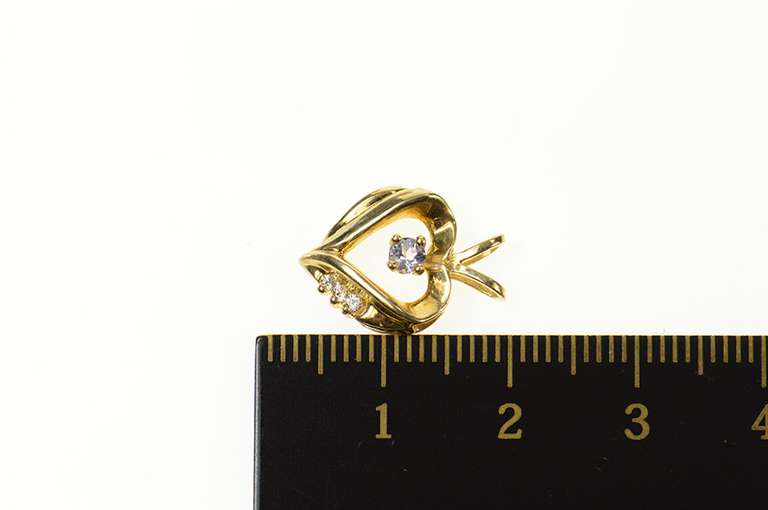 10K Yellow Gold Heart Syn. Tanzanite CZ Accent Heart Pendant