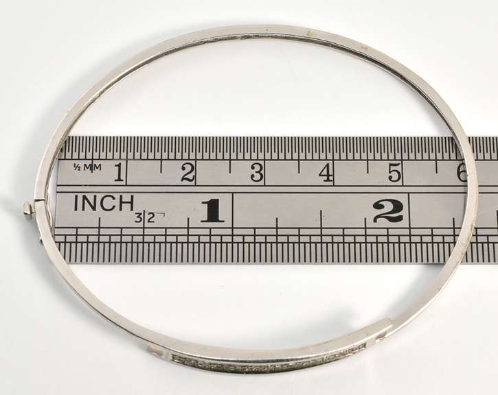White Gold Invisibly Set Diamond Bangle