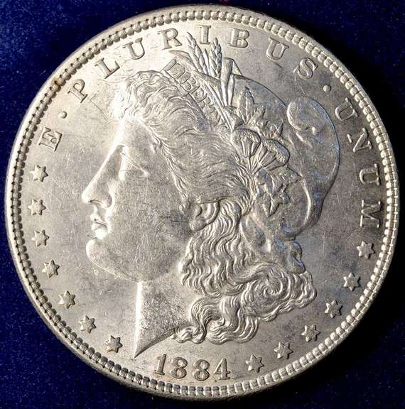 2 1884 Morgan Silver Dollars P & O Mint Marks. About Uncirculated.