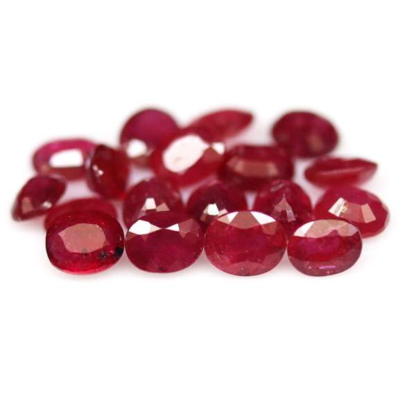 Vibrant 8.30ct oval cut imperial red Ruby set