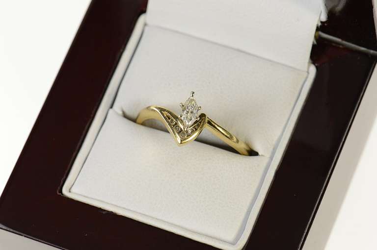 14K Yellow Gold 0.23 Ctw Marquise Diamond Bypass Engagement Ring