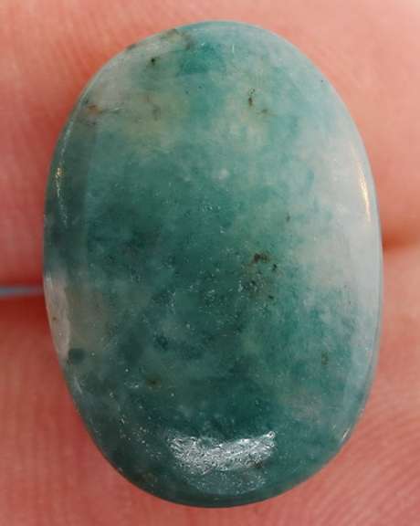 Rich bi-color 16.35ct untreated Grandidierite cabochon