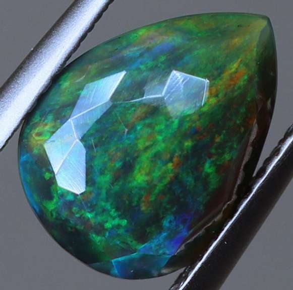 Silky 1.56ct floral fairy fire flashing Black Opal