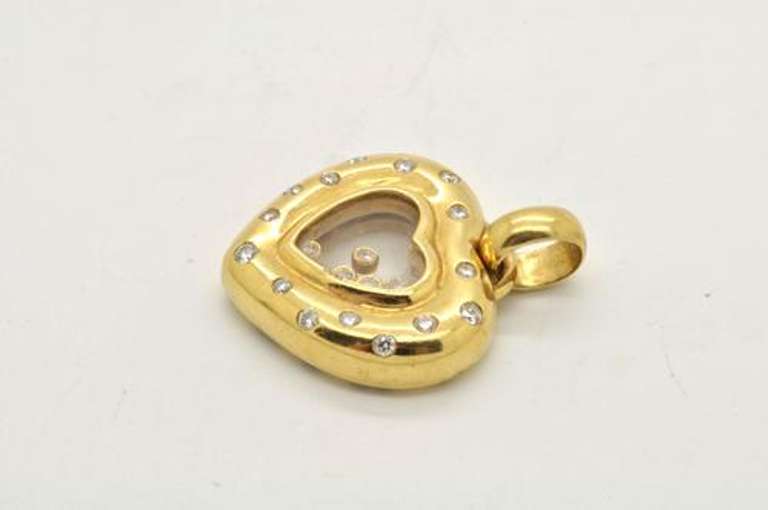 LADIES 18 KT GOLD HEART PENDANT